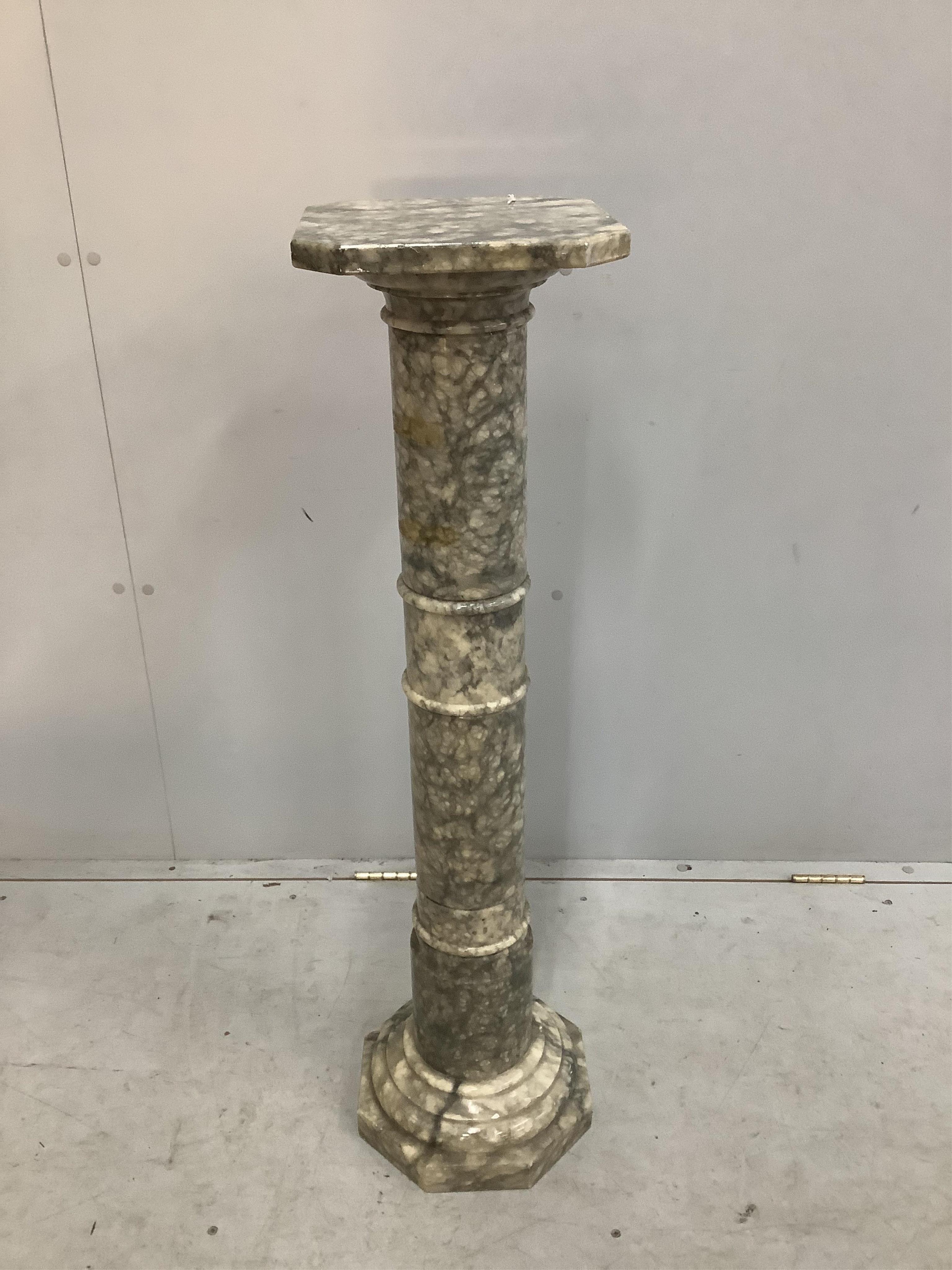 An alabaster pedestal, height 102cm. Condition - fair